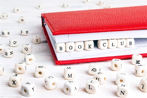 Book with bookclub spelt out in beads